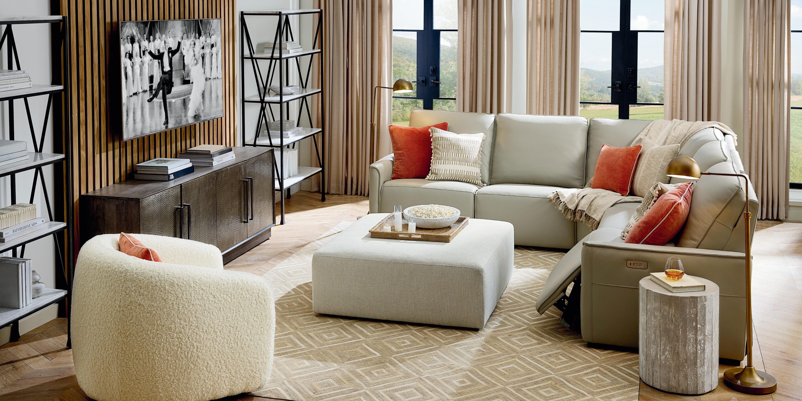 Bassett Everett leather modular reclining sectional at Watts Furniture and Mattress